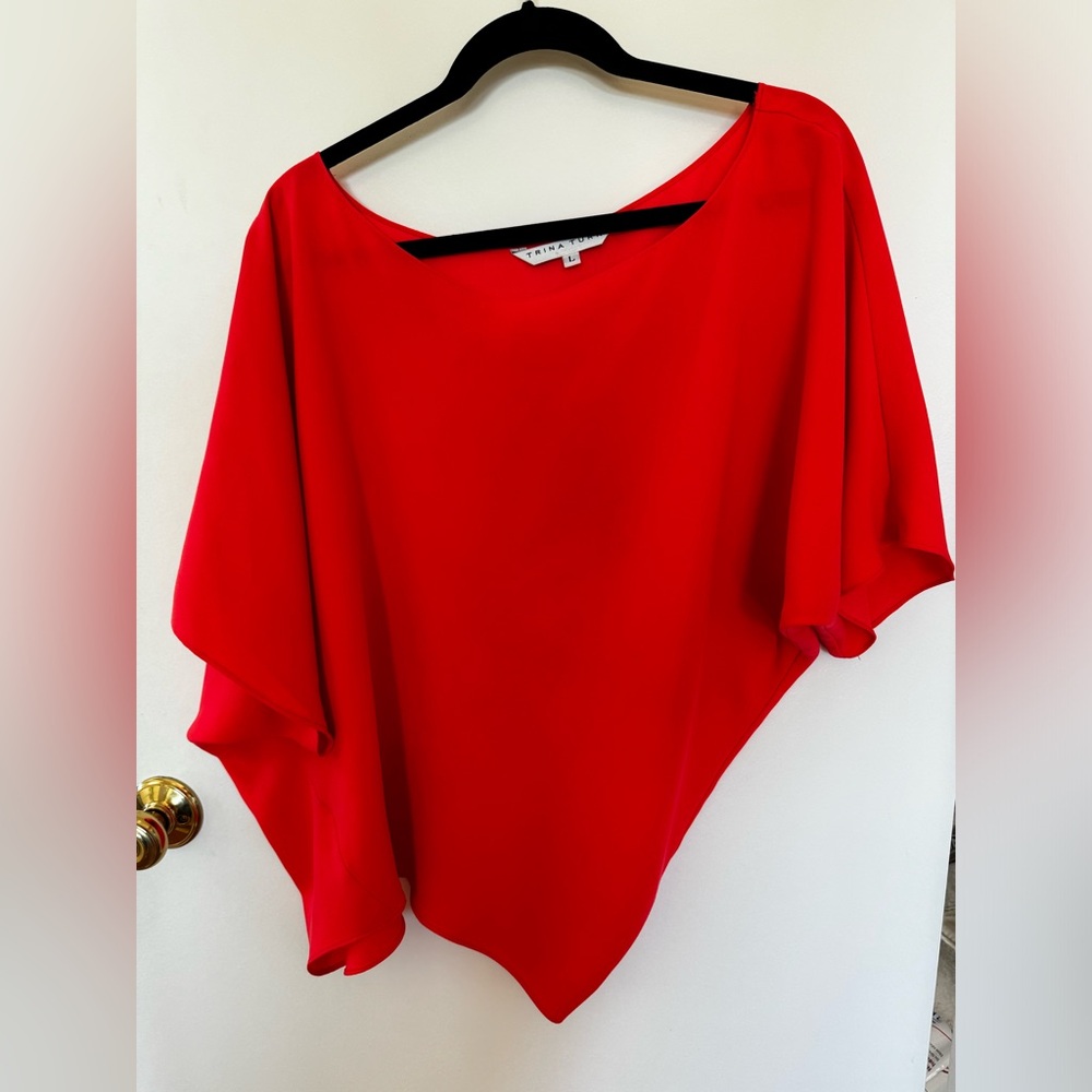 Trina Turk blouse asymmetric bottom, boat neck Large orange